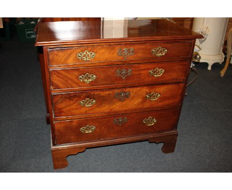 A Georgian style mahogany chest of four drawers on bracket feet, 87cm