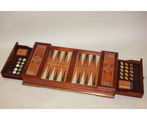 A Franklin Mint King Arthur and the Knights of the Round Table backgammon set with gold and silver plated game counters each 