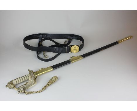 An 1827 pattern Naval officers sword, the leather and brass scabbard presented to H. Phillips by the Wardmaster S.B.P.O. & L.