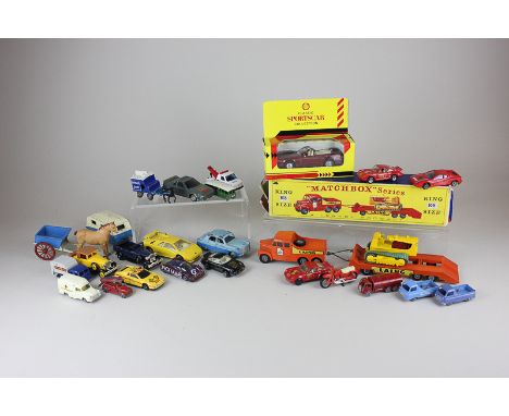 A Matchbox die-cast metal toy K-8 Tractor and Transporter, boxed (a/f) and a small collection of other unboxed play worn die-
