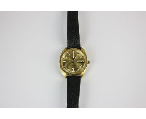 A gentleman's rolled gold Tissot electronic wrist watch