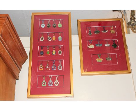 Two framed sets of Goodwood Racecourse members metal and enamel badges, and other loose badges