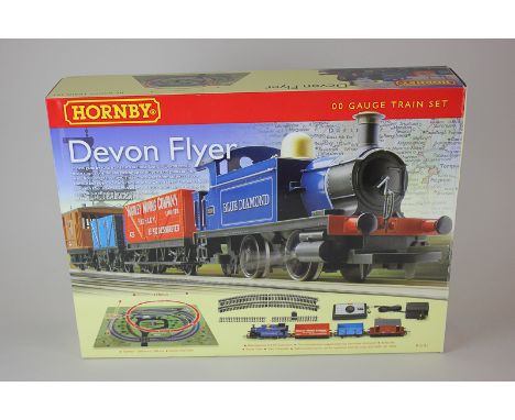 A Hornby '00' gauge Devon Flyer model railway train set (R1121) including 'Blue Diamond' locomotive, two open wagons and brak