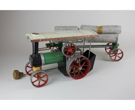 A Mamod steam traction engine, and a lumber wagon, both boxed (a/f)