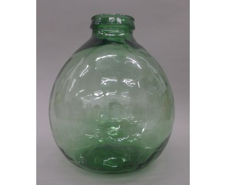 A vintage glass carbouy. 38 cm high.