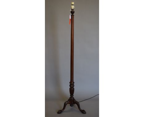 An early 20th century mahogany standard lamp. 157.5 cm high overall.