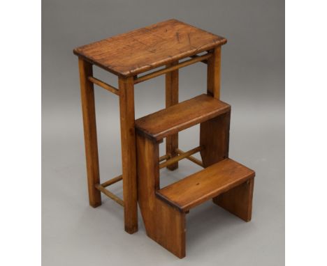 A set of vintage metamorphic library steps.  56 cm high. 