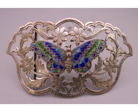 An Art Nouveau silver and enamel belt buckle.  9 cm x 5 cm. 