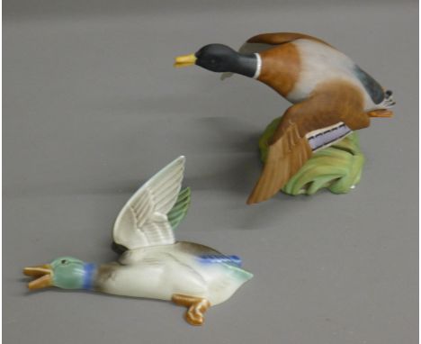 A Poole ceramic duck and a Spode ceramic duck. The latter 14.5 cm high.