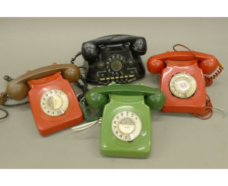 A box of vintage telephones.