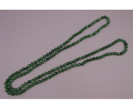A string of jade beads.  Approximately 130 cm long.