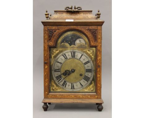 A marquetry inlaid walnut bracket clock, the dial inscribed B Thymen Fecit Gonda (adapted), together with a marquetry inlaid 