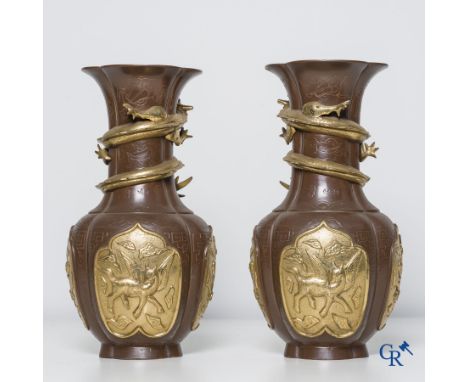 Asian Art, 2 bronze Chinese vases with dragon decor. Marked. | Height: 38.5 cm.