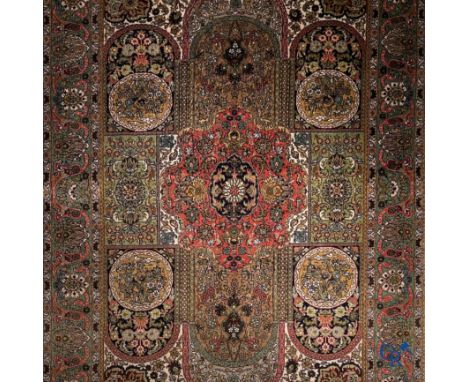 Oriental carpets, an exceptionally finely knotted silk miniature tapestry. | 46 x 32 cm.