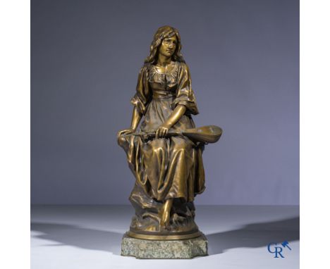 Paul Eugène Mengin (1853-1937) An imposing bronze statue on a green veined marble swivel base. Signed P. Mengin and foundry m