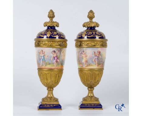 Porcelain: Sèvres: Pair of bronze mounted multi-coloured and decorated vases in Sèvres porcelain. LXVI style. Signed Rochette