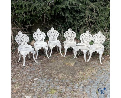 Garden decoration. A set of 6 garden chairs and 3 geuridons in cast iron, a metal garden bench attached. Good original condit