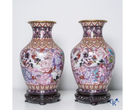 Asian Art, a pair of cloisonné vases with flowers, butterflies and cranes. 20th century. | Height: 51 cm.