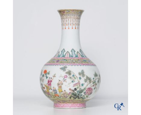 Asian Art, Chinese porcelain. A Chinese famille rose vase with playing children. 20th century. Marked. | Height: 39 cm. | Con