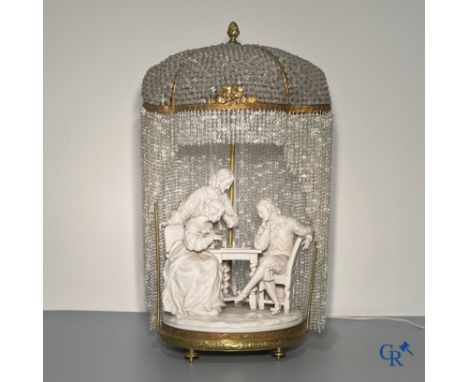 European porcelain, Karel Ens Volkstedt, a large lamp in biscuit and bronze, LXVI-style. Marked. Around 1920. | 53.5 x 30 x 2