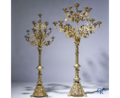 Religious objects, 2 massive bronze church candlesticks in Neo-Gothic style. Late 19th century. | 173 x 90 cm.153 x 63 cm.