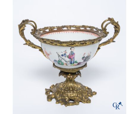 Chinese porcelain: An 18th century gilt-bronze mounted bowl in Chinese export porcelain. | Height: 18.5 cm.Diameter: 23 cm.