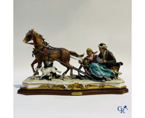 Porcelain: Capodimonte: Luciano Cazzola: (Sulla Neve) In the snow. Large group in Italian porcelain. Signed Cazzola and marke