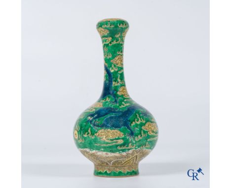 Asian Art, A fine Chinese green and yellow biscuit vase with dragon decor. Marked. | Height: 21 cm. | Condition: Minimal dama