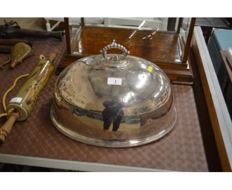 A large silver plated meat cover 