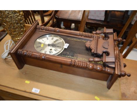 A modern two hole wall clock