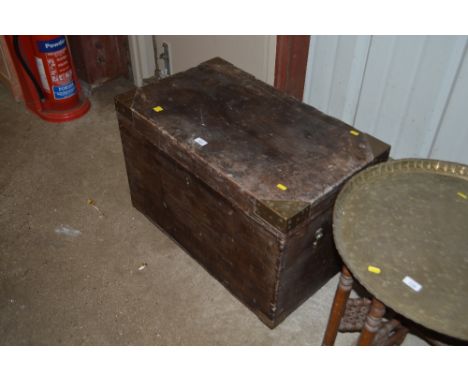 A stained pine and brass bound trunk 