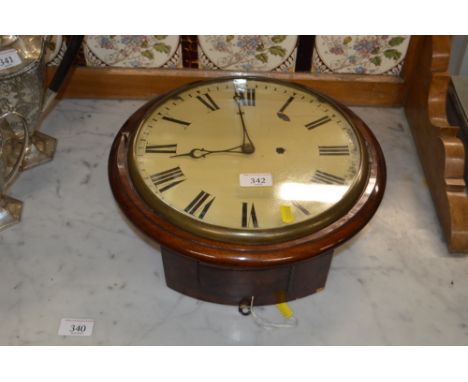 A Victorian mahogany circular single hole wall clock