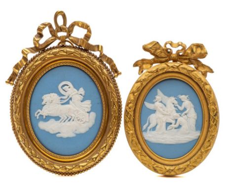 A Wedgwood blue jasper oval plaque and one similar: the first sprigged in white with 'The Three Graces watering Pegasus', imp