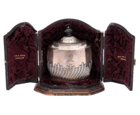 A Victorian silver tea caddy, maker Henry Stratford Ltd, Sheffield, 1887: crested, of oval outline with shallow domed hinged 
