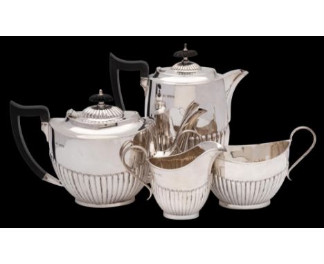 A George V silver four-piece tea service, maker Viners Ltd, Sheffield, 1926: of oval tapering form with half reeded decoratio