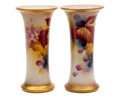 A pair of Royal Worcester porcelain trumpet shaped vases painted by Kitty Blake: with blackberries, blossom and foliage withi