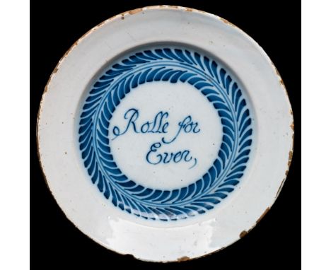 A Bristol blue and white delftware 'Electioneering' plate: inscribed 'Rolle for Ever' within a Merryman wreath cartouche, ear