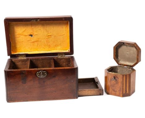 A George III mahogany, cross banded and boxwood strung tea caddy: of rectangular outline with canted corners, the hinged lid 