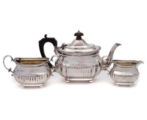 A late Victorian bachelor's silver matched  three-piece tea service, maker Charles Stuart Harris, London, 1898: the teapot ma