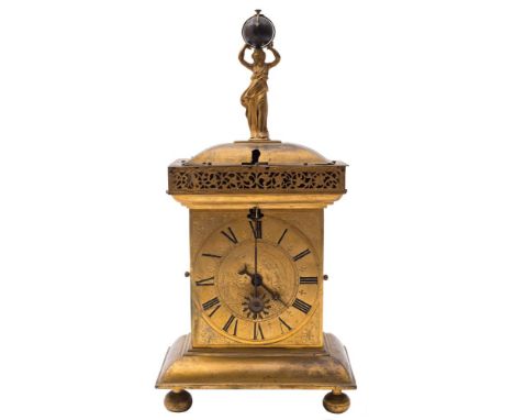 An Augsburg brass mantel clock with unusual globe date: the short duration movement having a verge escapement and striking th