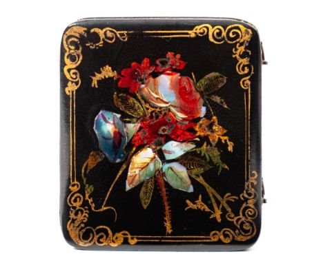An unusual mid 19th century black silhouette portrait in lacquered Union case: with oval silhouette of a gentleman, the black