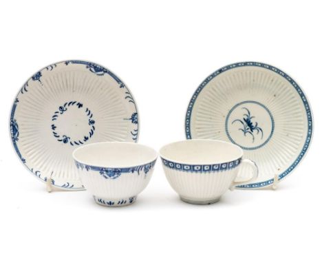 A First Period Worcester blue and white reeded teabowl and saucer and a St.Cloud teabowl and saucer of similar design: painte