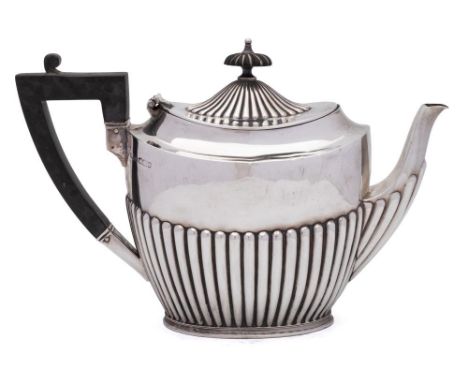 A 20th century silver teapot, maker James Dixon &amp; Sons, Sheffield, date letter worn: of oval outline with half reeded dec
