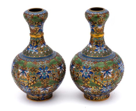 A pair of Chinese champleve enamel garlic-mouth bottle vases: each  decorated with a raised design of peonies, scrollwork and