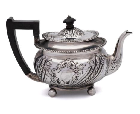 A Victorian silver teapot, maker Martin Hall &amp; Co, Sheffield, 1897: of barge-shaped outline, with embossed floral decorat