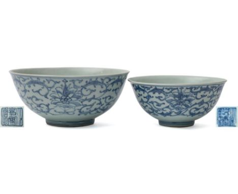 A Chinese blue and white peony scroll bowl and a similar smaller example: each with rounded sides and flared rim, the exterio