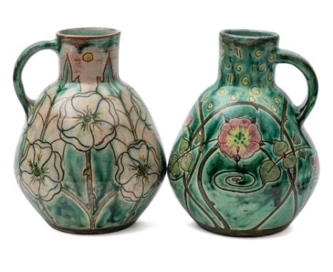 Two Della Robbia pottery jugs and vase: the former of globular form with short raised neck and strap handle incised with Art 