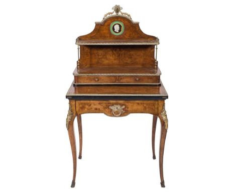 A 19th Century French walnut, inlaid and brass mounted Bonheur du Jour: crossbanded and bordered with boxwood and ebony lines