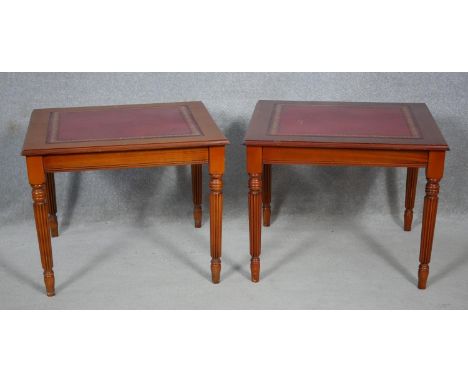 A pair of late Georgian style mahogany lamp tables with inset leather tops on reeded tapering supports. H.48 L.61 W.61cm 