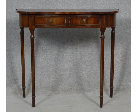 A Georgian style mahogany console table by Reprodux. H.73 W.80 D.34cm 